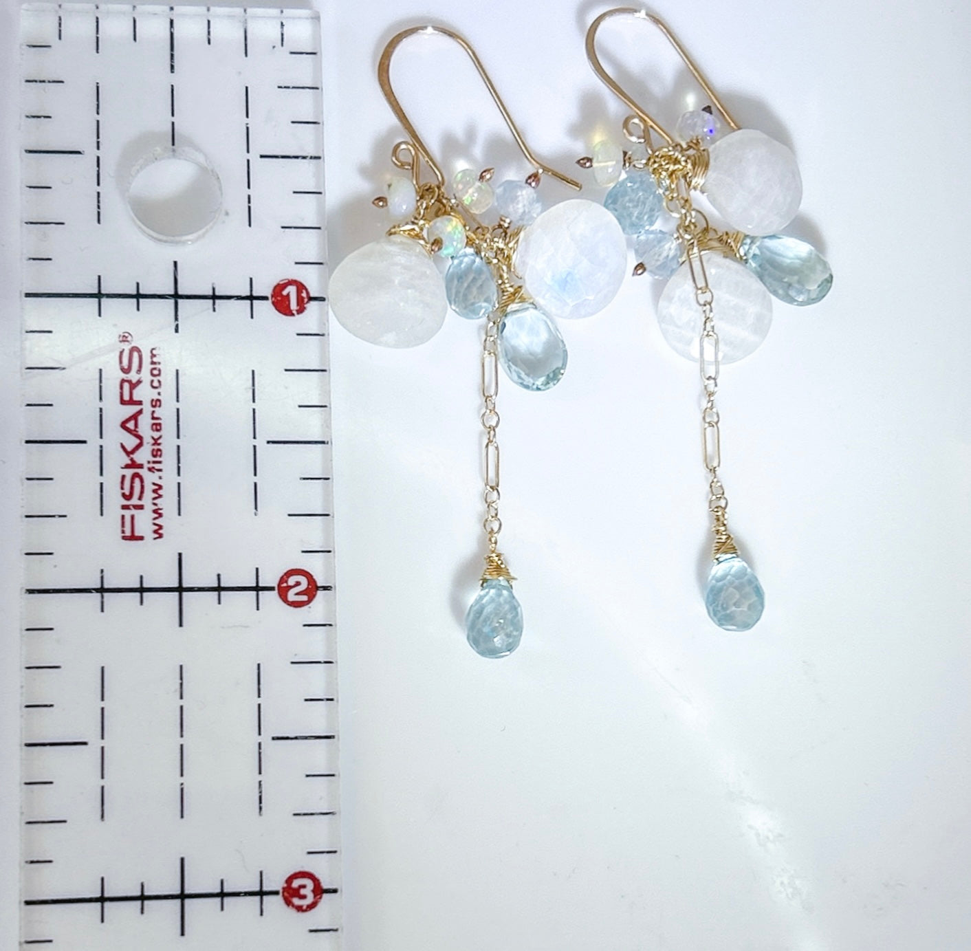 Moonstone, Aquamarine, and blue topaz, cascading beach wedding earrings, long dangle cluster earrings with rainbow blue flash moonstones