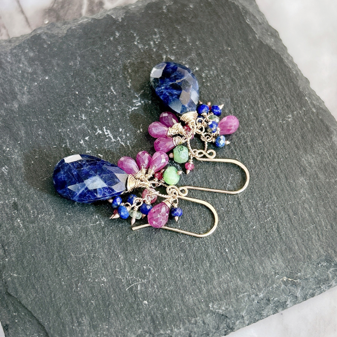 Natural sodalite dangle earrings with Ruby, lapis, emerald.
one of a kind pair.