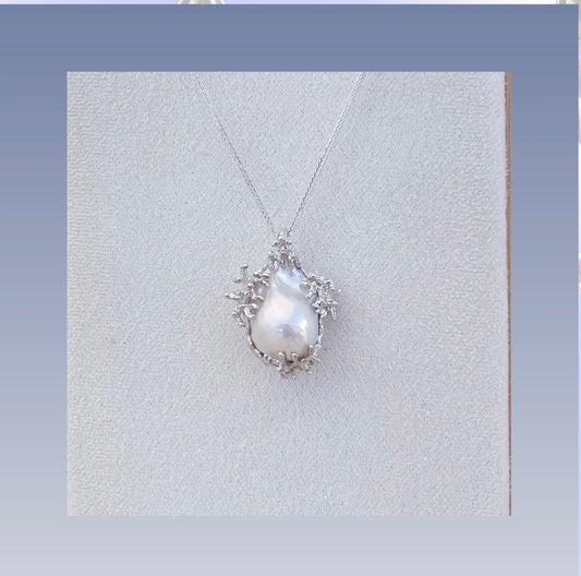 baroque pearl pendant, an exclusive flame ball cultured pearl necklace with artisan sterling silver branches