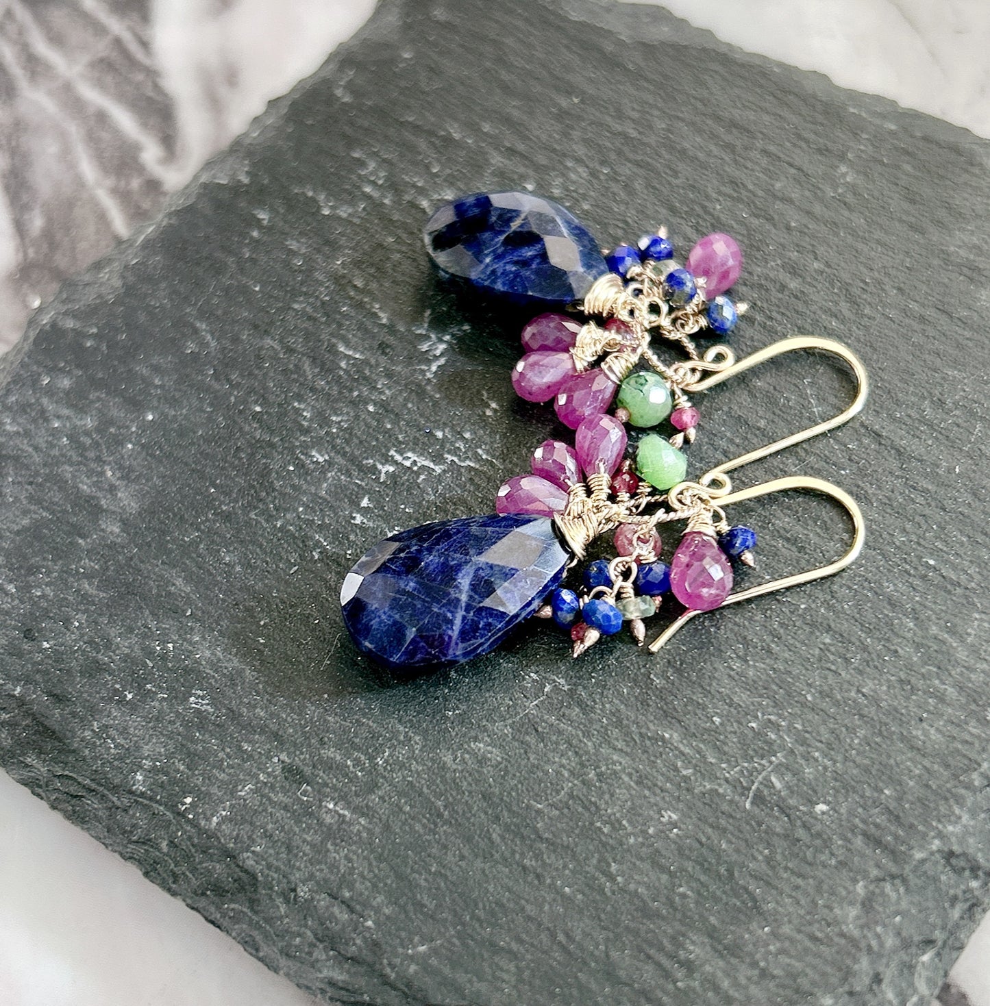 Natural sodalite dangle earrings with Ruby, lapis, emerald.
one of a kind pair.