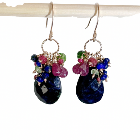 Natural sodalite dangle earrings with Ruby, lapis, emerald.
one of a kind pair.