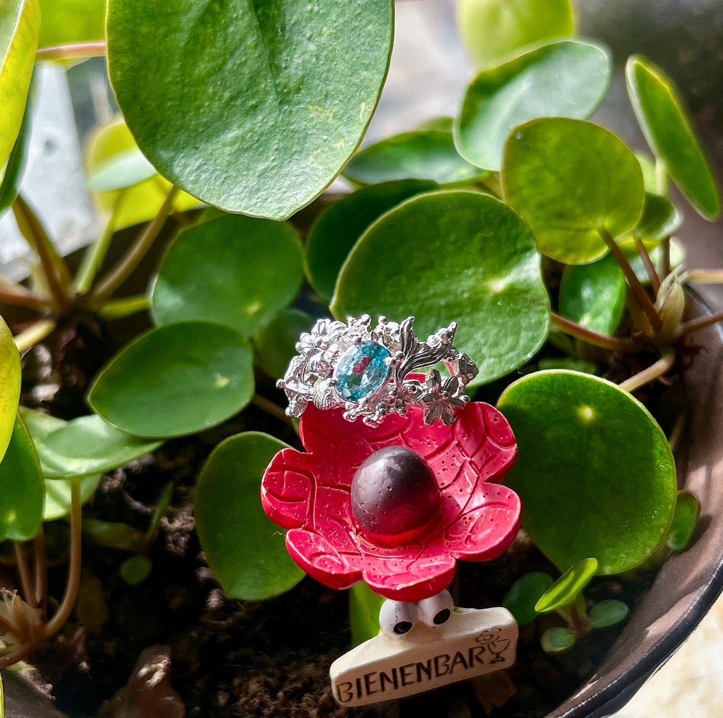 The natural Cambodia blue zircon ring in solid Sterling silver. ocean inspired contemporary engagement ring.