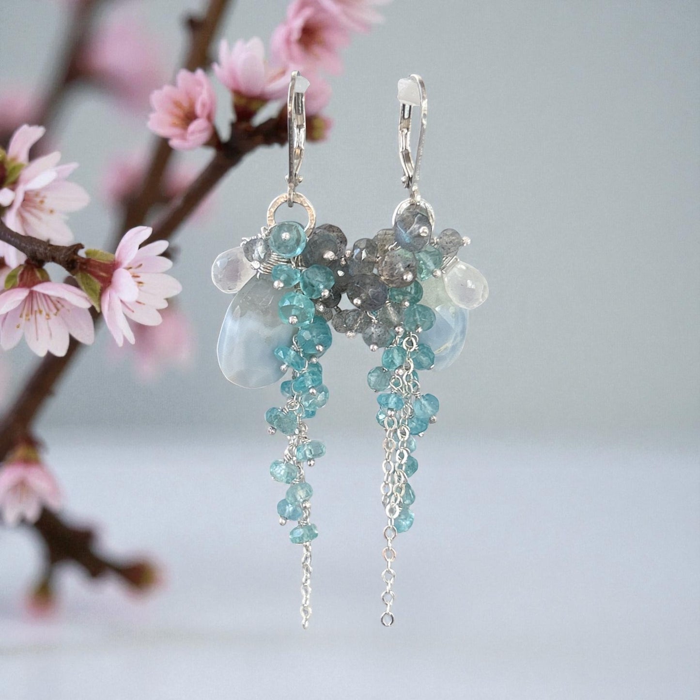 Winter wonderland earring with blue opal, teal apatite, labradorite. Snowy winter outfits for holiday season