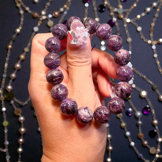 All natural purple charoite, no treatment or encouragement.  charoite with less to no black veins