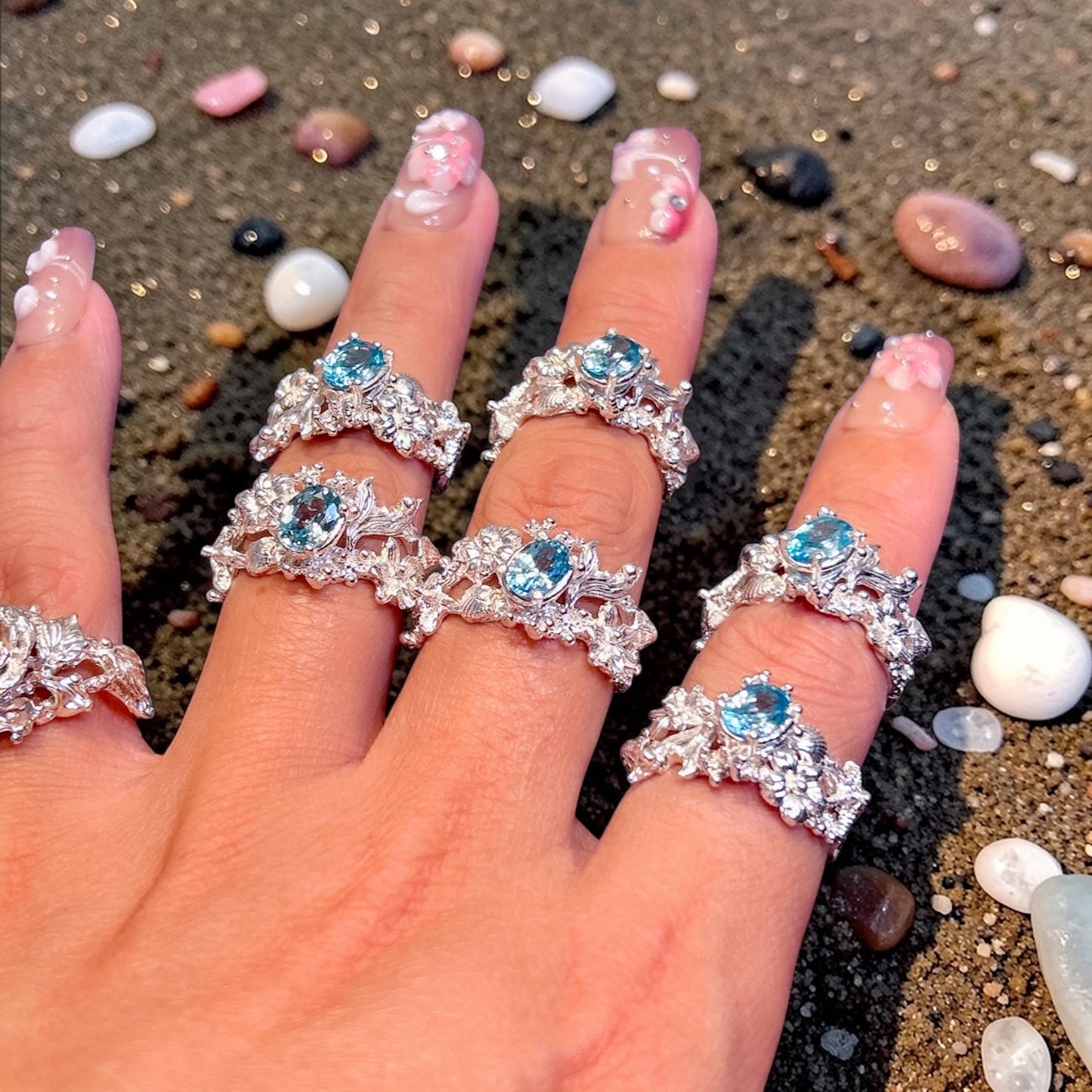 The natural Cambodia blue zircon ring in solid Sterling silver. ocean inspired contemporary engagement ring.